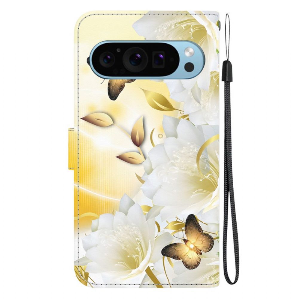 Lederhüllen Google Pixel 9 Goldene Schmetterlinge Und Weiße Blumen Mit Riemen