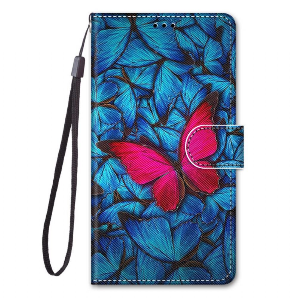 Flip Case Für Samsung Galaxy M23 5G Roter Schmetterling Auf Blauem Hintergrund