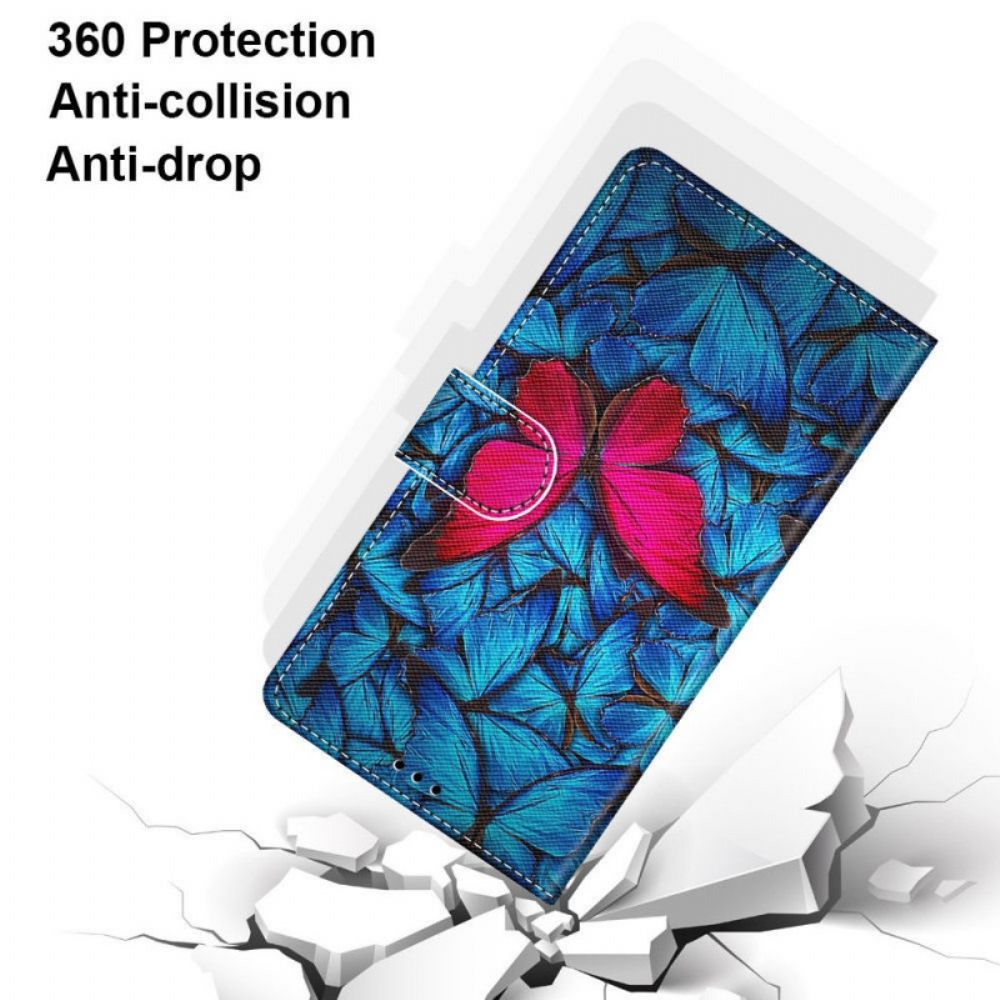 Flip Case Für Samsung Galaxy M23 5G Roter Schmetterling Auf Blauem Hintergrund