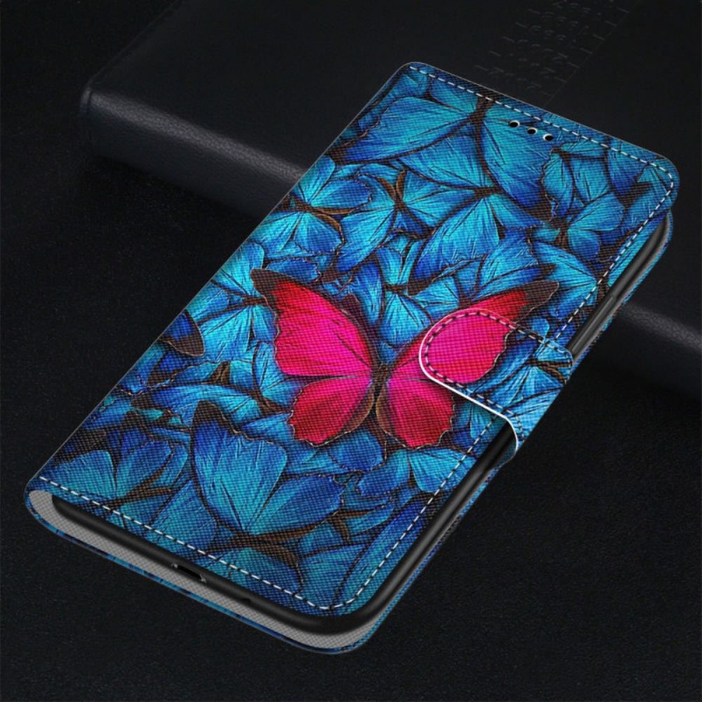 Flip Case Für Samsung Galaxy M23 5G Roter Schmetterling Auf Blauem Hintergrund