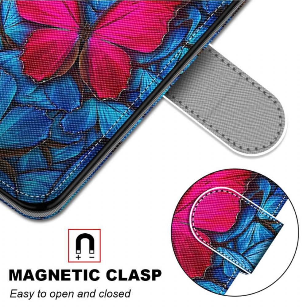 Flip Case Für Samsung Galaxy M23 5G Roter Schmetterling Auf Blauem Hintergrund