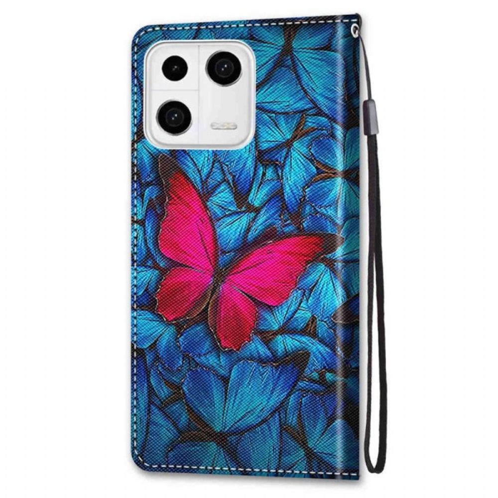 Lederhüllen Für Xiaomi 13 Roter Schmetterling. Blauer Hintergrund