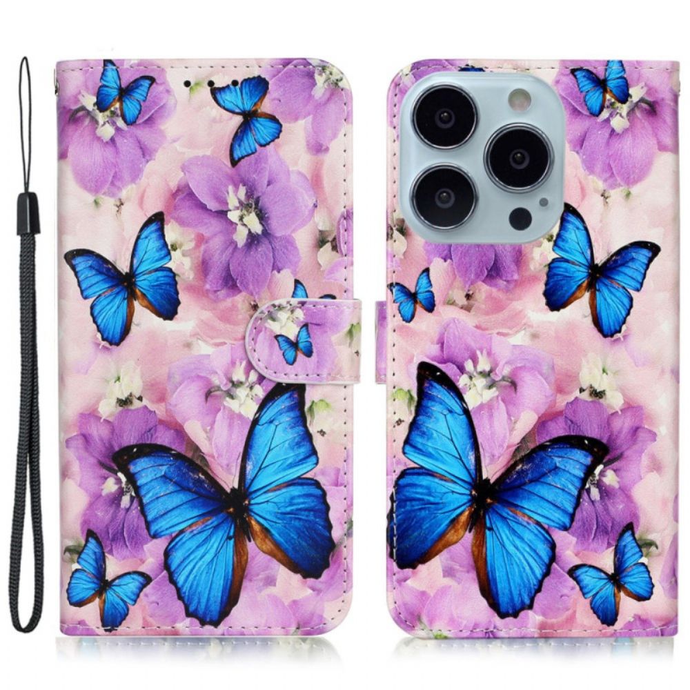 Lederhüllen iPhone 16 Pro Max Schmetterlinge Und Lila Blumen Mit Riemen