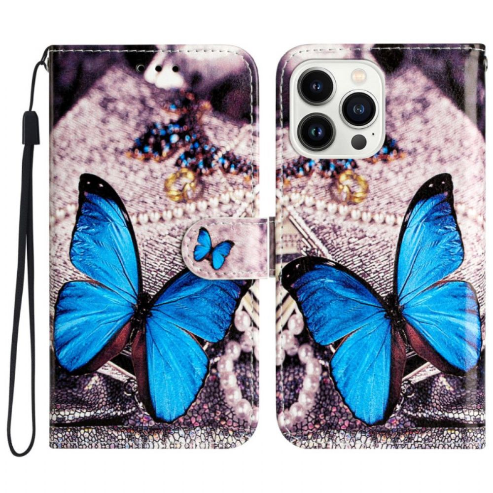 Lederhüllen iPhone 16 Pro Blauer Schmetterling Mit Riemen