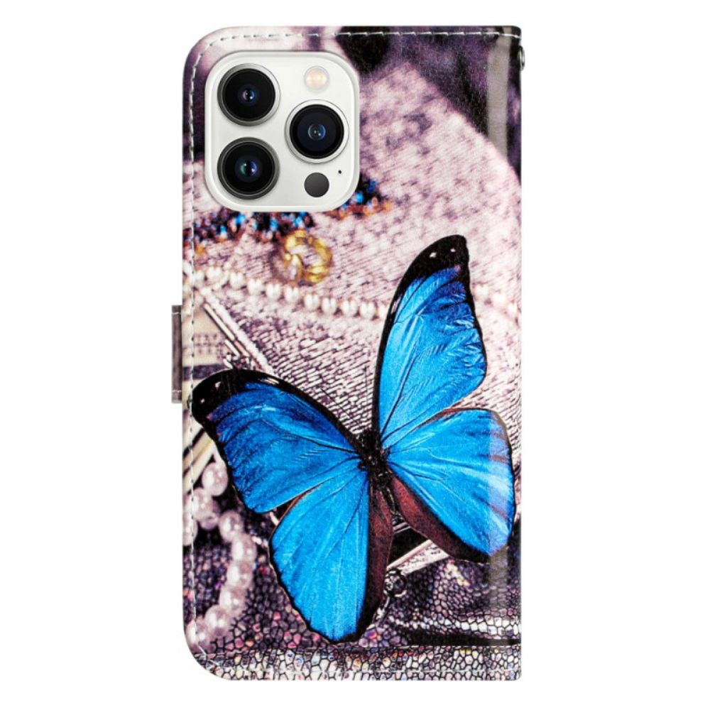 Lederhüllen iPhone 16 Pro Blauer Schmetterling Mit Riemen