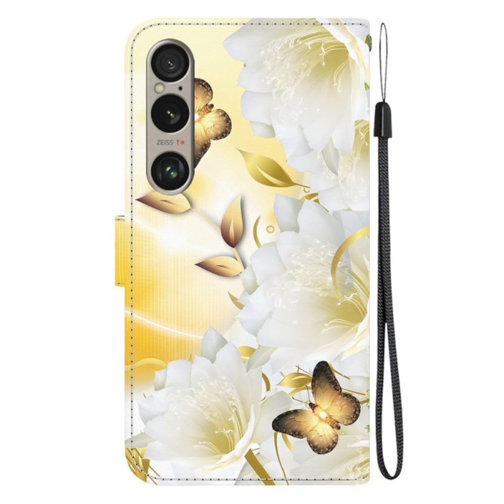 Lederhüllen Sony Xperia 1 Vi Goldene Schmetterlinge Und Weiße Blumen Mit Riemen